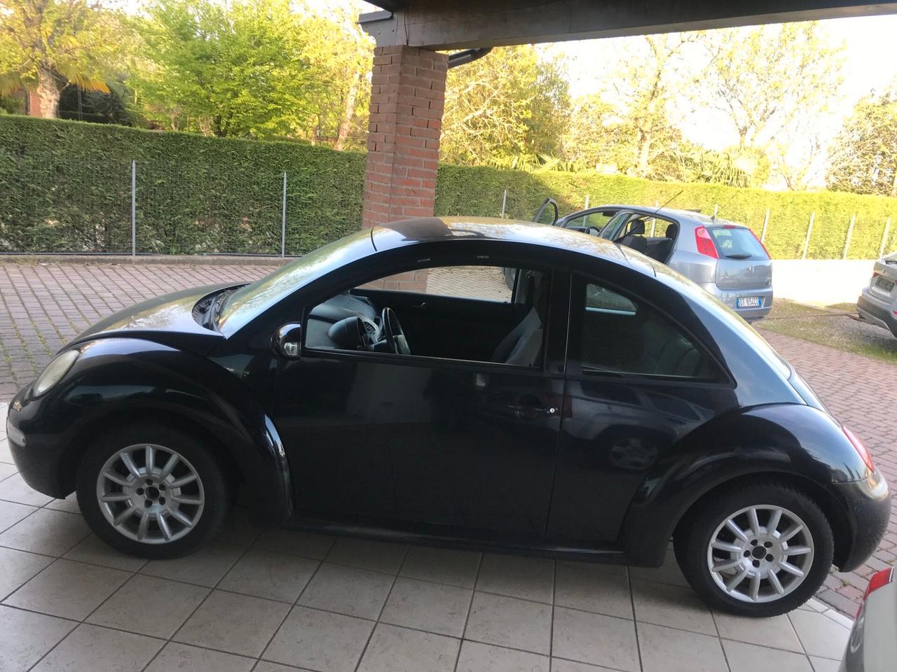 Volkswagen New Beetle 1.4 benzina 55 kw cabrio