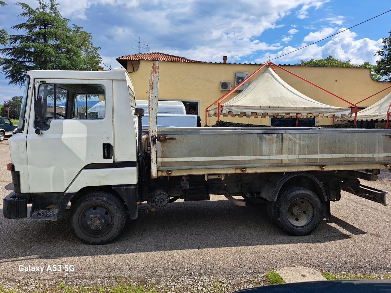 Nissan L-35 ribaltabile trilaterale patente b