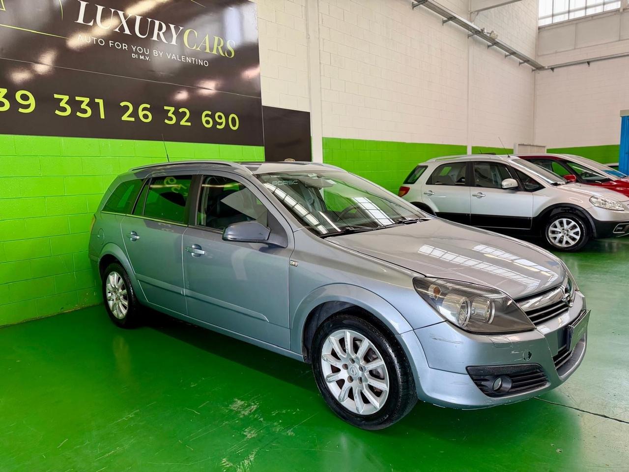 Opel Astra 1.6 16V Twinport Station Wagon Cosmo