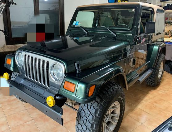 JEEP Wrangler 4.0 Sahara 1997 Verde/Beige Automatico con soli 110.000 km