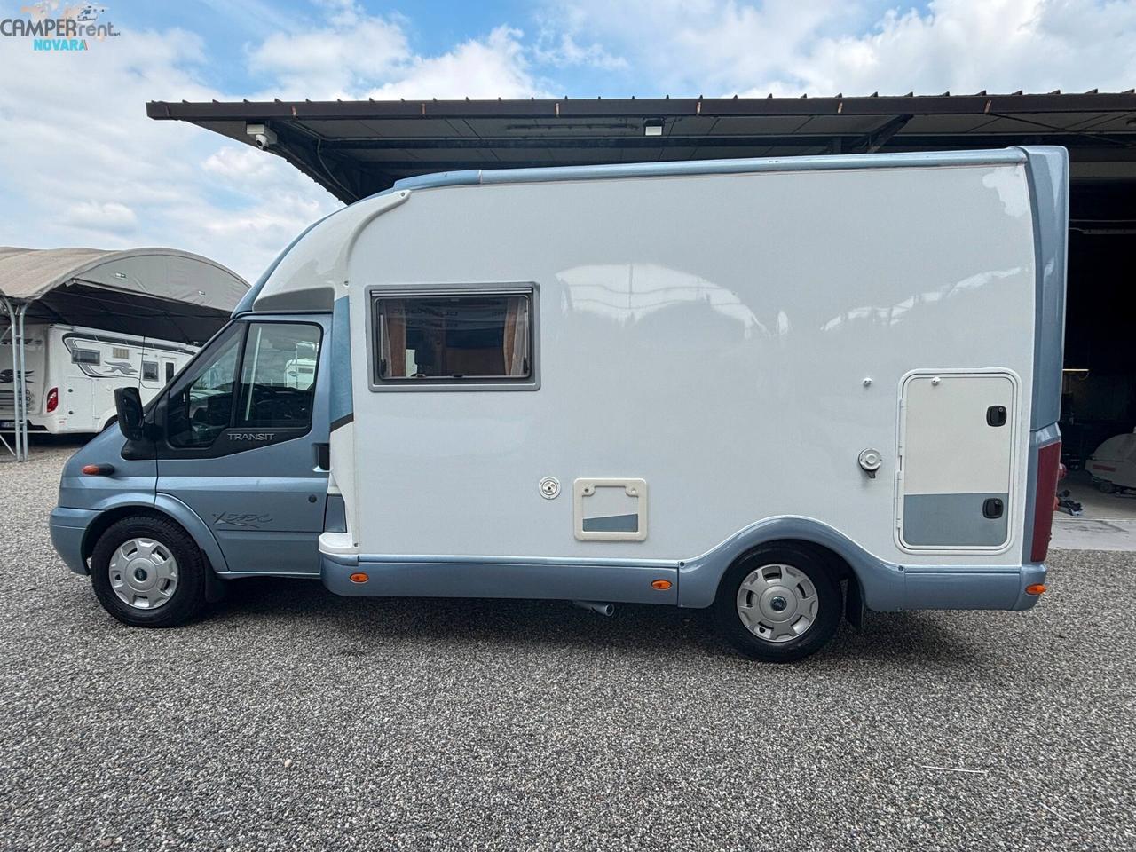 LAIKA X 595 C VAN - Semintegrale con letto matrimoniale in coda e garage (volume interno 68x103 )