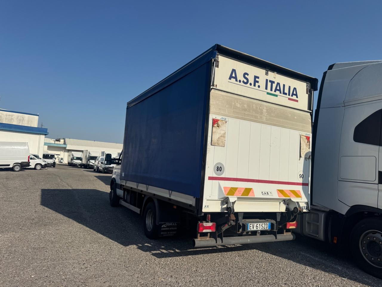 Iveco Dailly 65 con telone e pedana idraulica